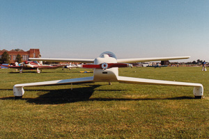 Unique aircraft on display at a sunny airshow