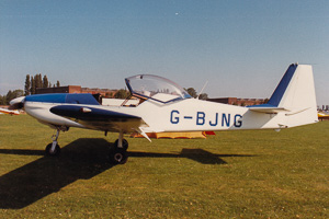 Classic aircraft on a sunny airfield during summer