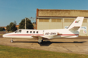 Luxury jet parked at the airstrip on a sunny day