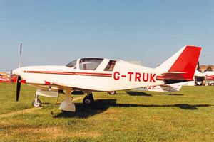 Classic aircraft showcased on a sunny day