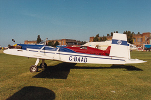 Vintage aircraft parked on a sunny day