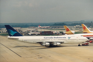 Garuda Indonesia plane at busy airport