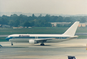 Plane in motion at busy terminal