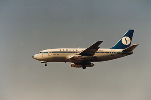 Historic aircraft in serene sky approach
