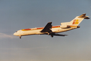 Vintage aircraft gliding gracefully toward runway