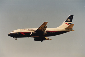 Airliner lands at sunset in clear skies