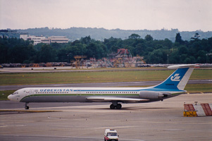 Uzbekistan Airlines jet on the runway at dusk