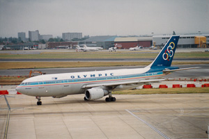 Vintage planes taxi at busy airport