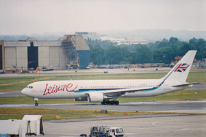 Airliner prepares for takeoff at bustling airport
