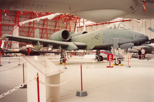 Military planes in museum hangar