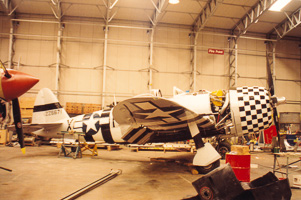 Historic aircraft restoration in a hangar